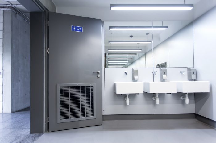 Porte Ei-30 avec grille coupe-feu Alpe Mercor Assa-Abloy